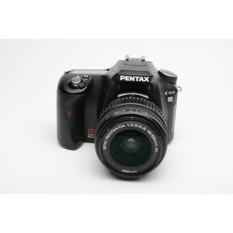Pentax K100D DSLR w/18-55mm f3.5-5.6 zoom, manuals, book, strap, cap, UV, Clean!